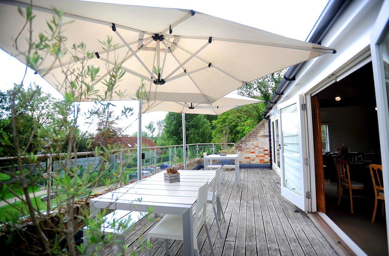 Tuddenham Mill Luxury Hotel Экстерьер фото A patio umbrella