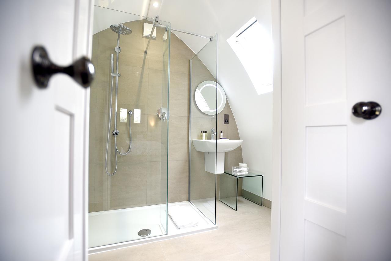 Tuddenham Mill Luxury Hotel Экстерьер фото A shower enclosure