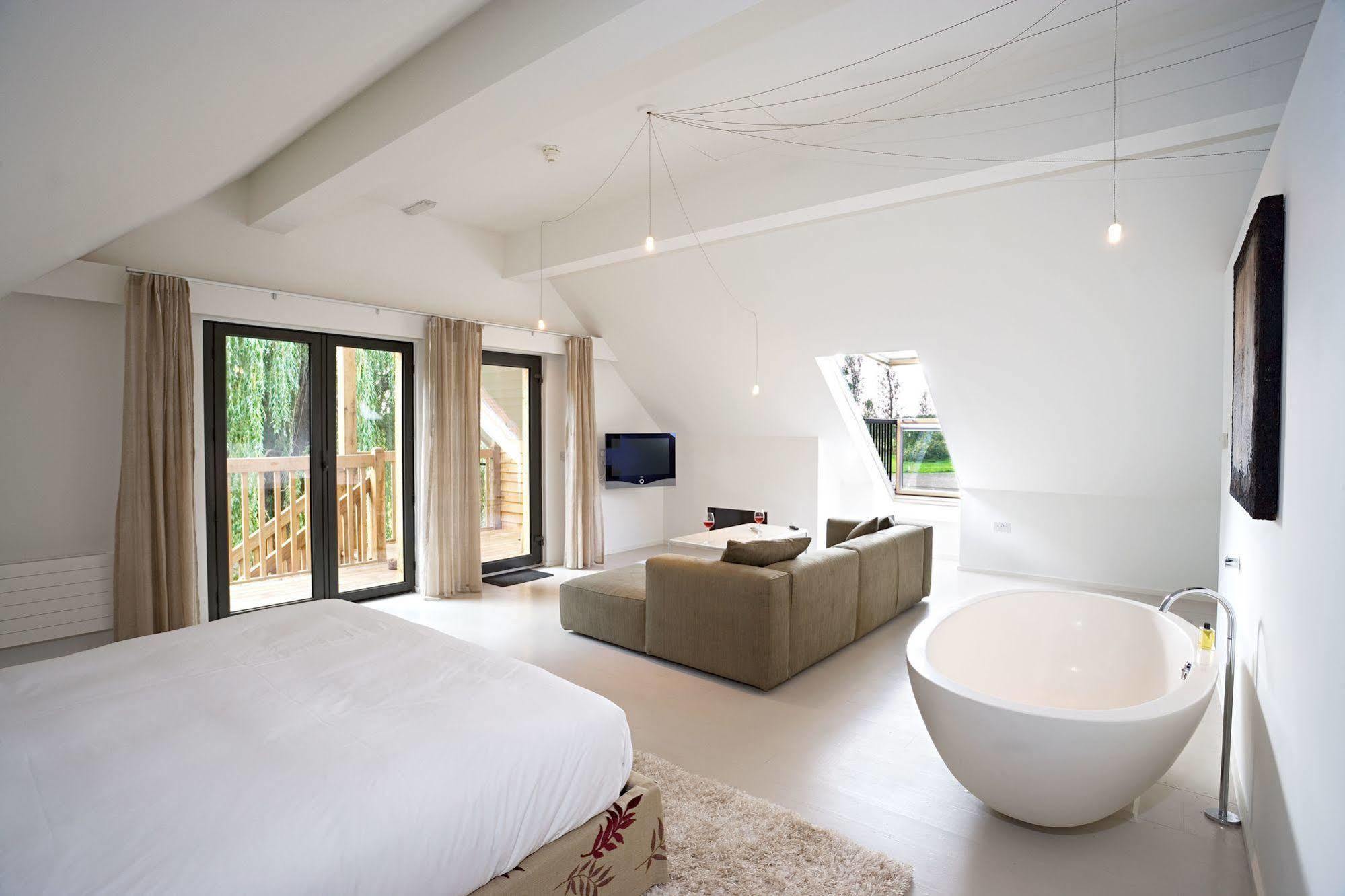 Tuddenham Mill Luxury Hotel Экстерьер фото The interior of a suite at The Old Course Hotel, St Andrews