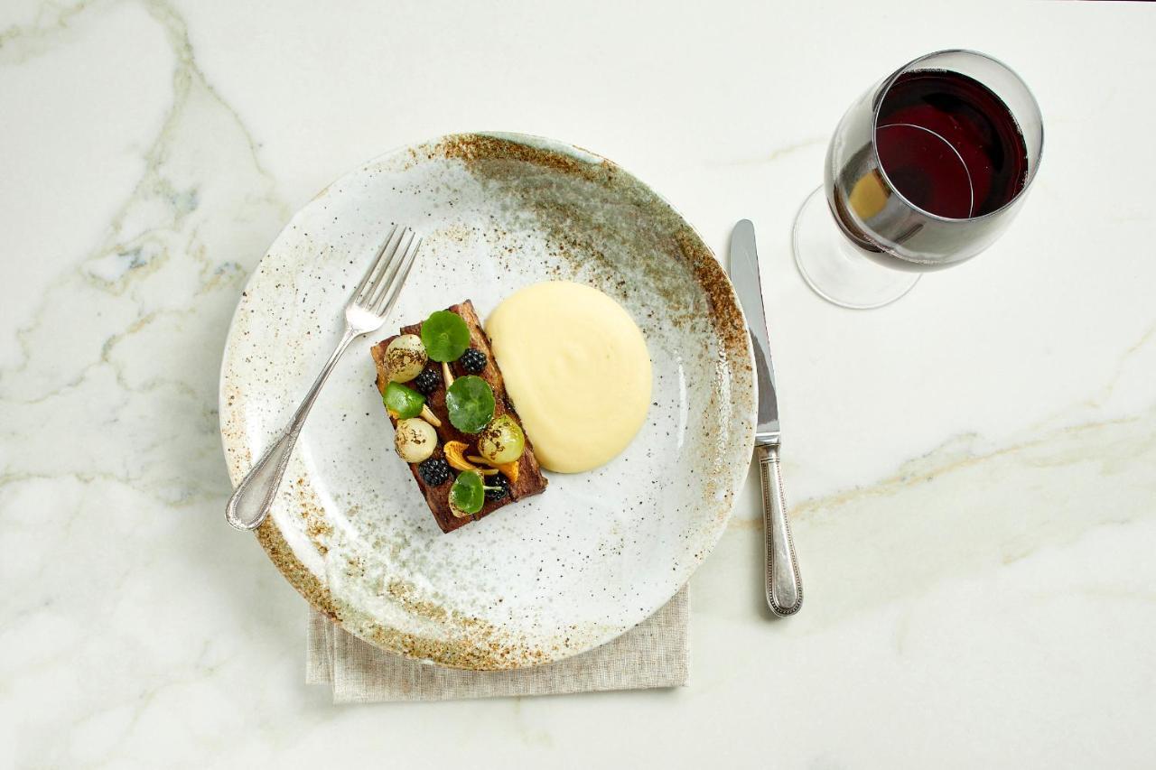 Tuddenham Mill Luxury Hotel Экстерьер фото A dish from the restaurant